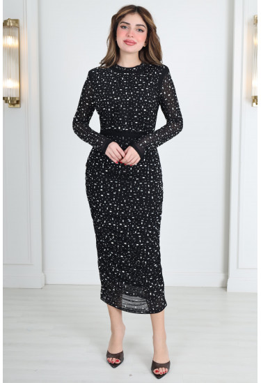 فستان نسائي مزين بفصوص الاستراس