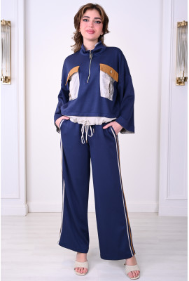 طقم نسائي أنيق واسع مع لمسات عصرية