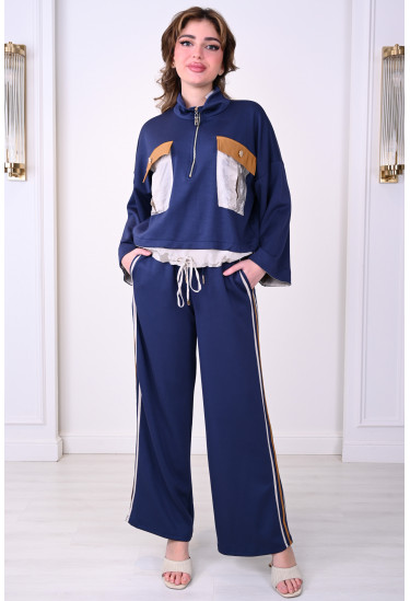 طقم نسائي أنيق واسع مع لمسات عصرية