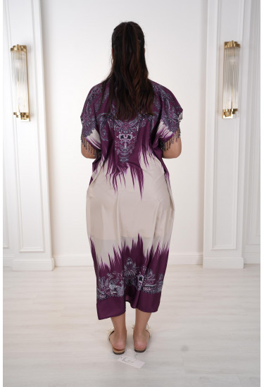 فستان نسائي بنقشات شرقية ولمسات كريستالية