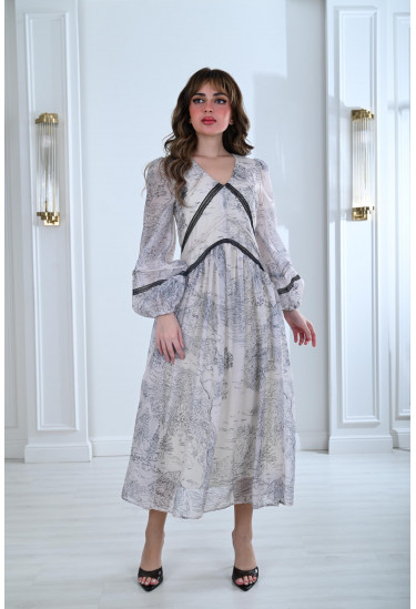 فستان بطباعات خريفية و تفاصيل دانتيل أنيقة