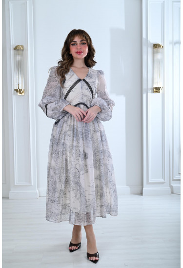 فستان بطباعات خريفية و تفاصيل دانتيل أنيقة