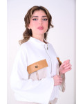 طقم نسائي أنيق واسع مع لمسات عصرية