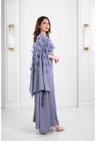 فستان سهرة طويل بزهور متطايرة 