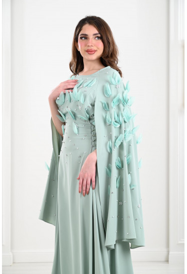 فستان سهرة طويل بزهور متطايرة 