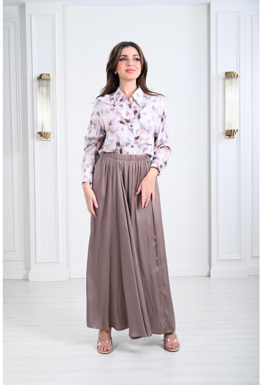 بلوزة نسائية مزينة برسومات هندسية