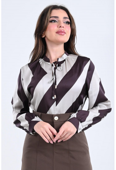 بلوزة نسائية أنيقة بتصميم منسدل