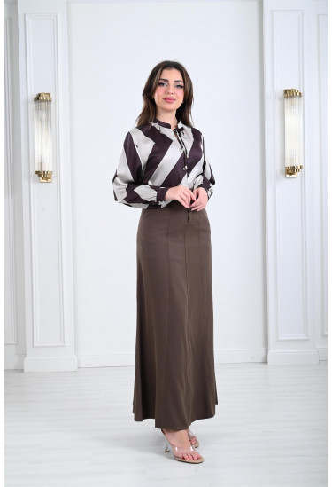 بلوزة نسائية أنيقة بتصميم منسدل