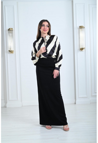 بلوزة نسائية أنيقة بتصميم منسدل