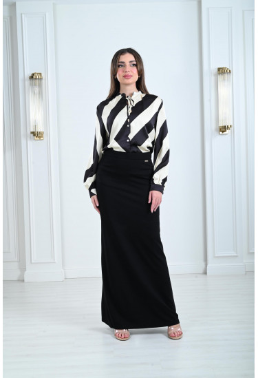 بلوزة نسائية أنيقة بتصميم منسدل