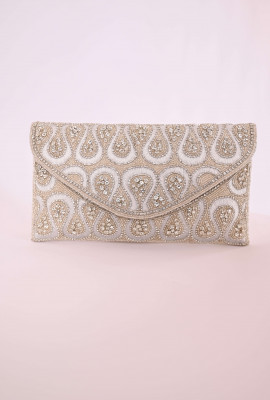 شنطة سهرة أنيقة بنقوش لامعة