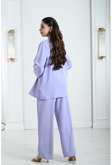 طقم نسائي مُزين بستراس لامع