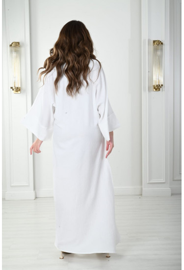 جلابيه طويله مزينه بالازهار المطرزه بشكل انيق 