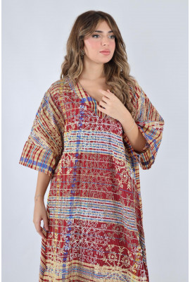 جلابية تراثية مطرزة بألوان دافئة ونقشة كاروهات عصريه جلابية تراثية مطرزة بألوان دافئة ونقشة كاروهات عصريه