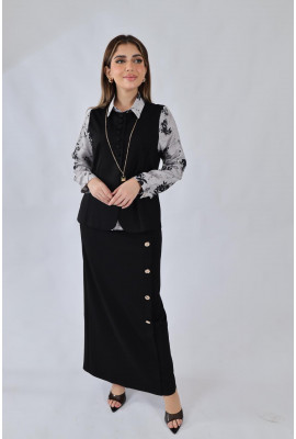 طقم نسائي أنيق بتنورة طويلة ولمسة عصرية