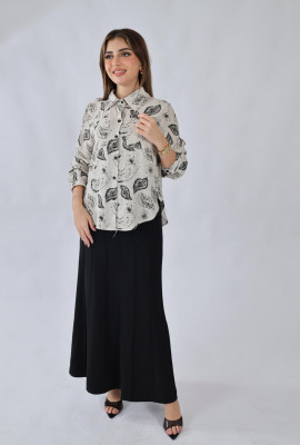 بلوزة نسائية بطبعة أوراق شجر