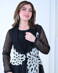 فستان بلمسات ملكية وتطريز راقي