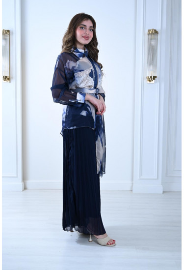 طقم فاخر بلمسة فنية لإطلالة راقية وأنيقة