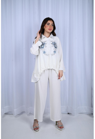 طقم نسائي بتطريز رقيق