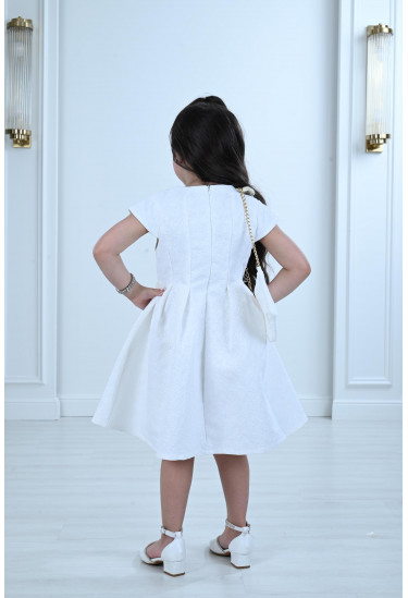 فستان أطفال بتصميم مودرن يواكب موضة العصر